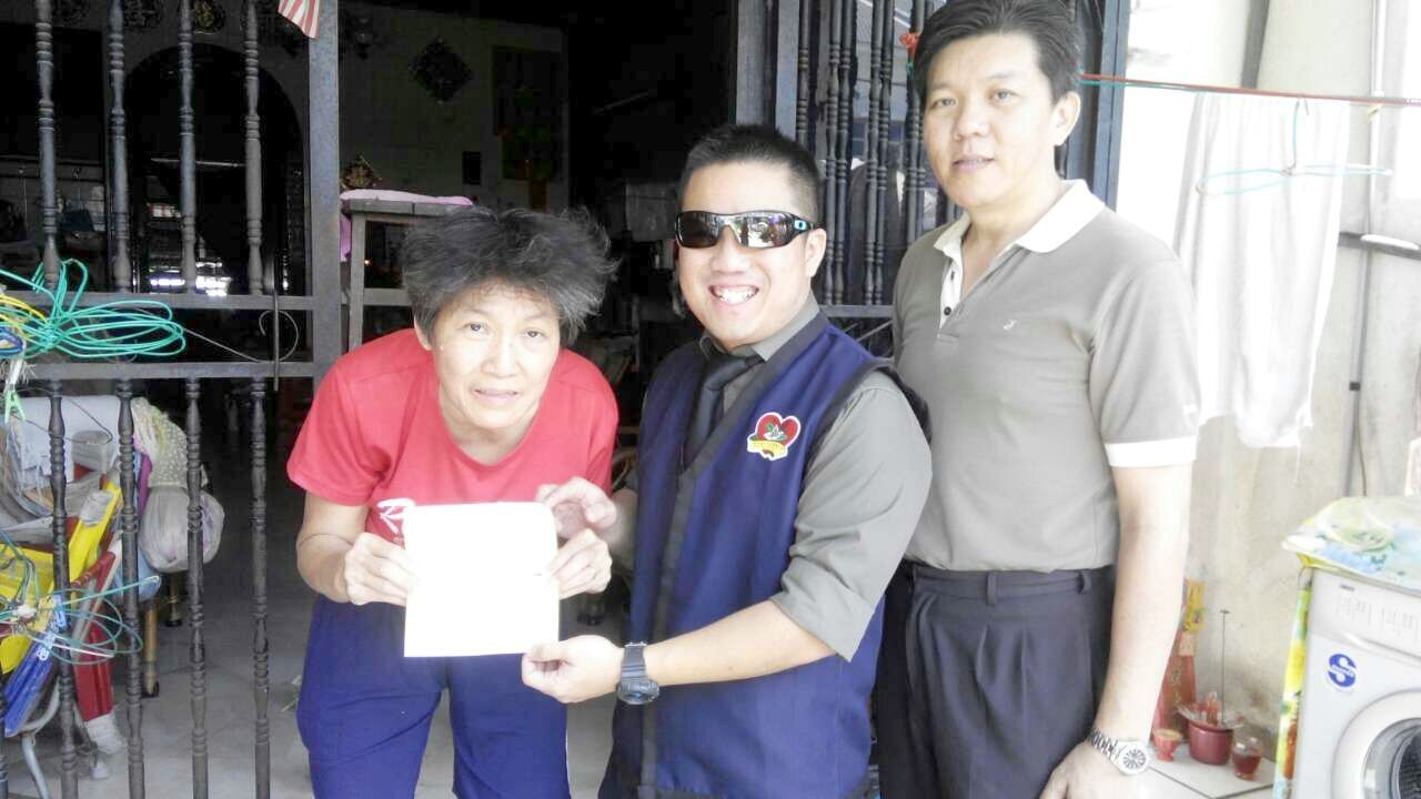 Delivering a cheque to the lady